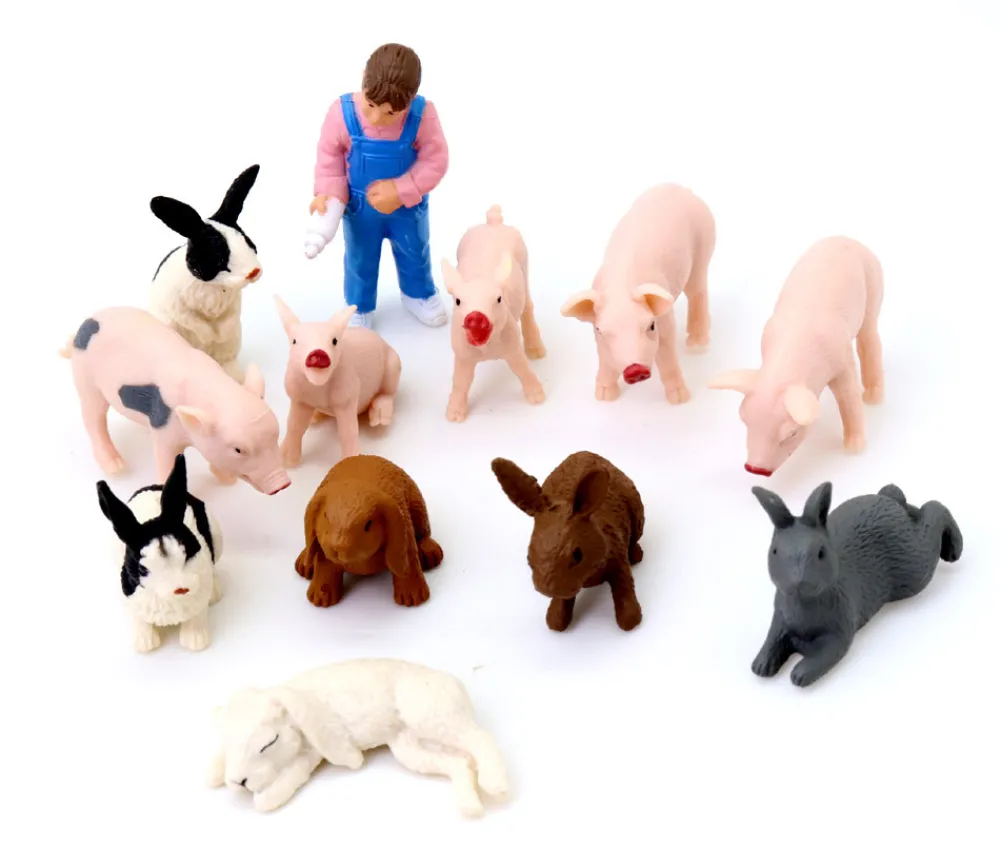 Tout Pour le Jeu 12 figurines Ferme : lapins, porcelets et fermière dans un tube de rangement
