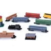 Tout Pour le Jeu 10 Figurines trains à vapeur dans un tube de rangement